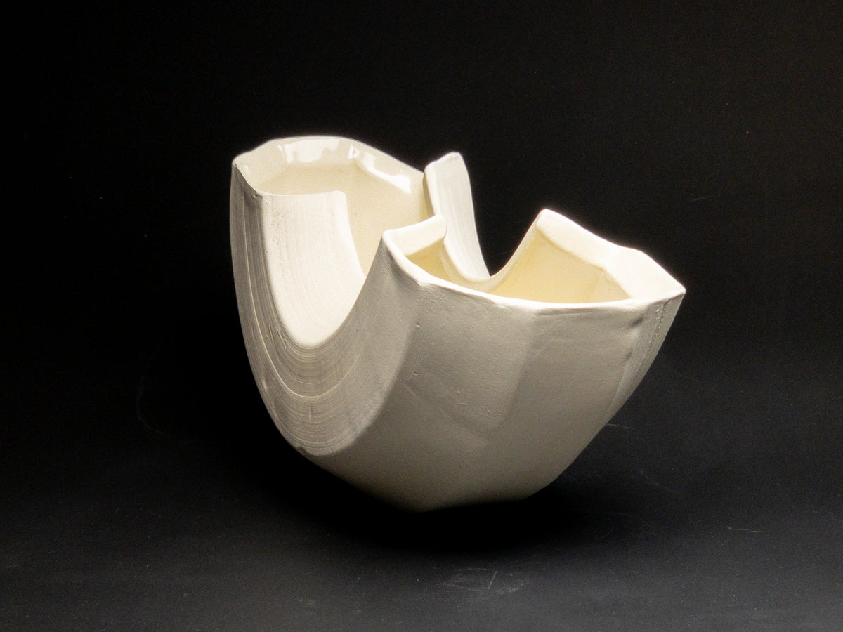 Creamy Arc — JeanElton ArcVessel in Neutral & Earth, three-quarter view