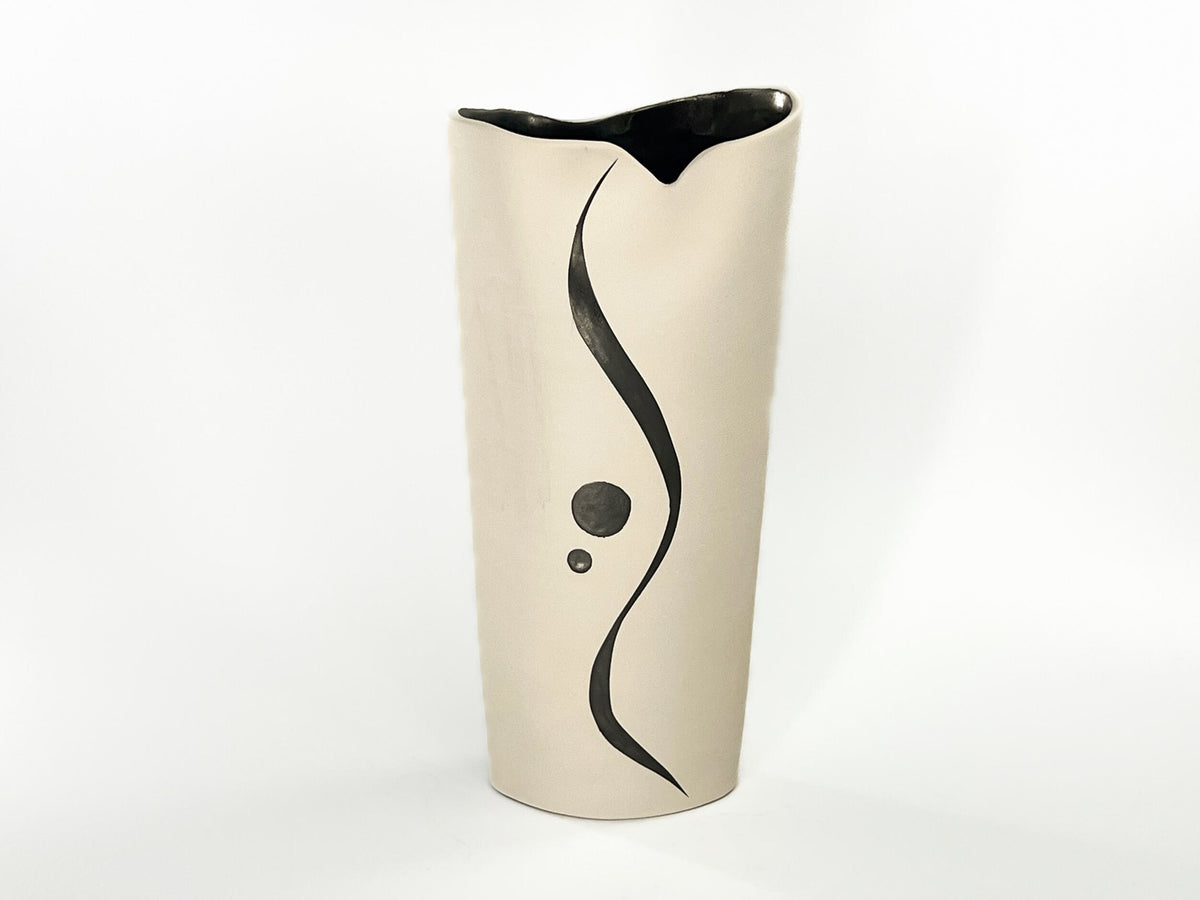 Quiet Orbit — JeanElton OvalVase in Black & Cream, front view