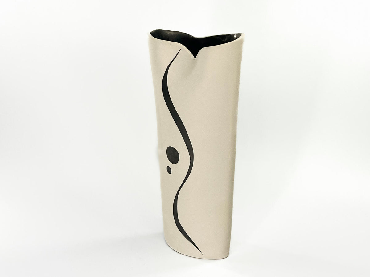 Quiet Orbit — JeanElton OvalVase in Black & Cream, three-quarter view